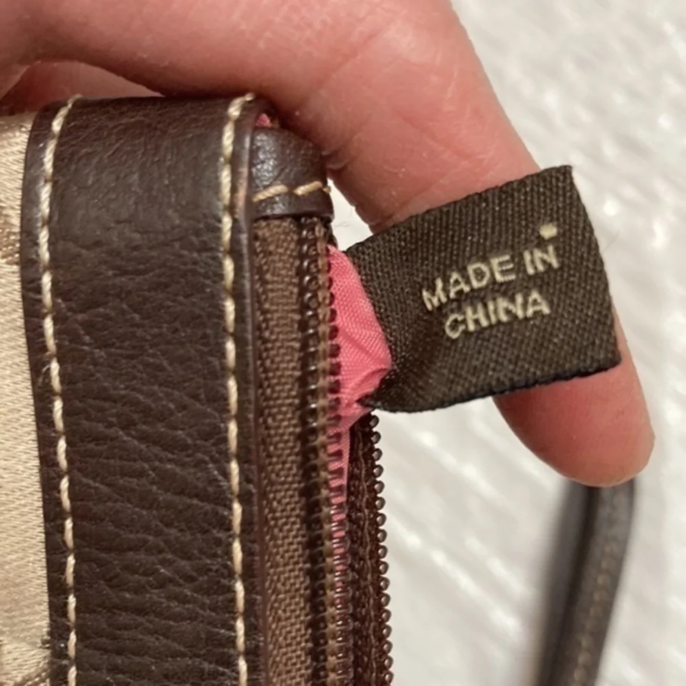 Coach carriage brown wristlet bag